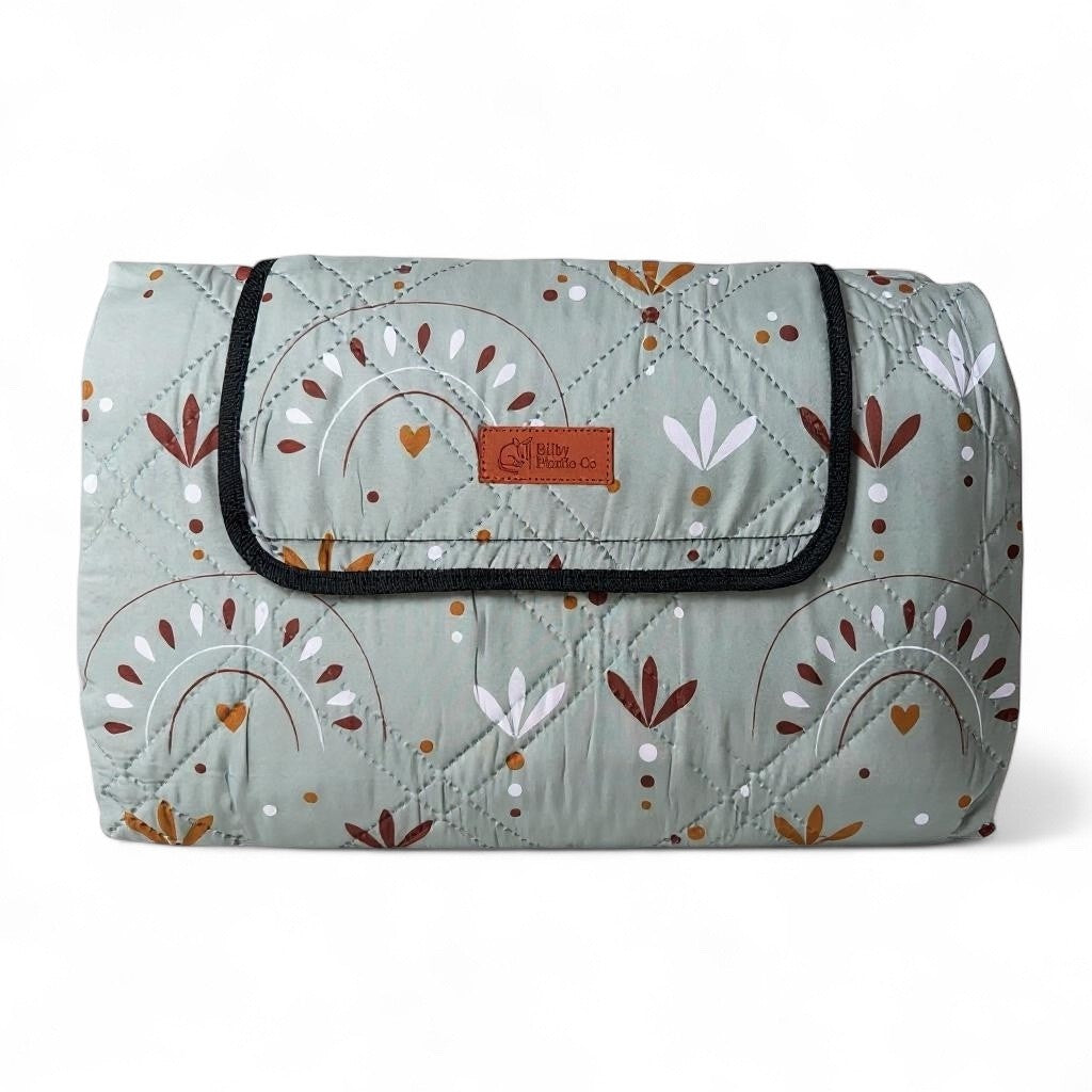 boho picnic blankey folded neatly, showing compct design of the Bilby Picnic Co picnic rug.