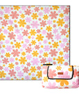 retro floral picnic rug on white background, shown open and folded with yellow and pink floral design